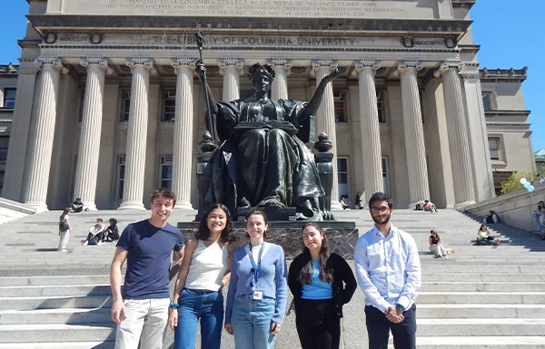 Columbia Alliance interns in front of Alma Mater