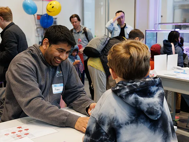 IICD researcher running an interactive activity at Zuckerman Institute Saturday Science events in collaboration with BioBus. Photo credit: Sirin Samman. 