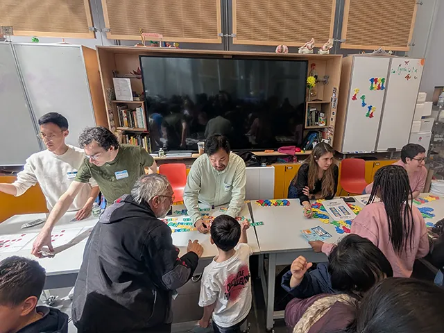Researchers running an interactive activity at Zuckerman Institute Saturday Science events in collaboration with BioBusResearchers running an interactive activity for for BioBus 