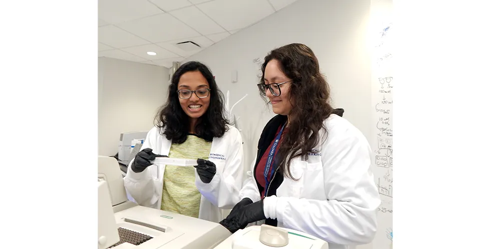 Mathini Vaikunthan (left) and IICD SRP mentee Vanessa Rivas (right)
