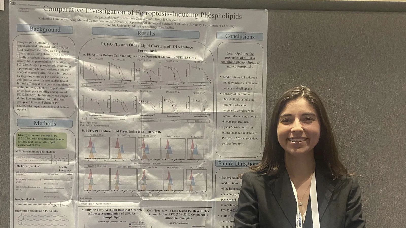 Megan Rodriguez  stands in front of her poster at the ASBMB Meeting on Ferroptosis