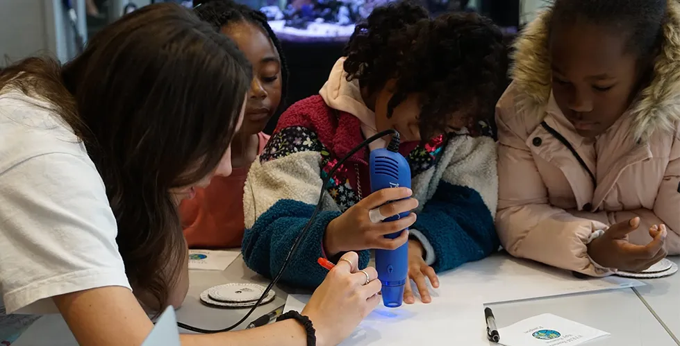Children decrypting ciphers written in invisible ink
