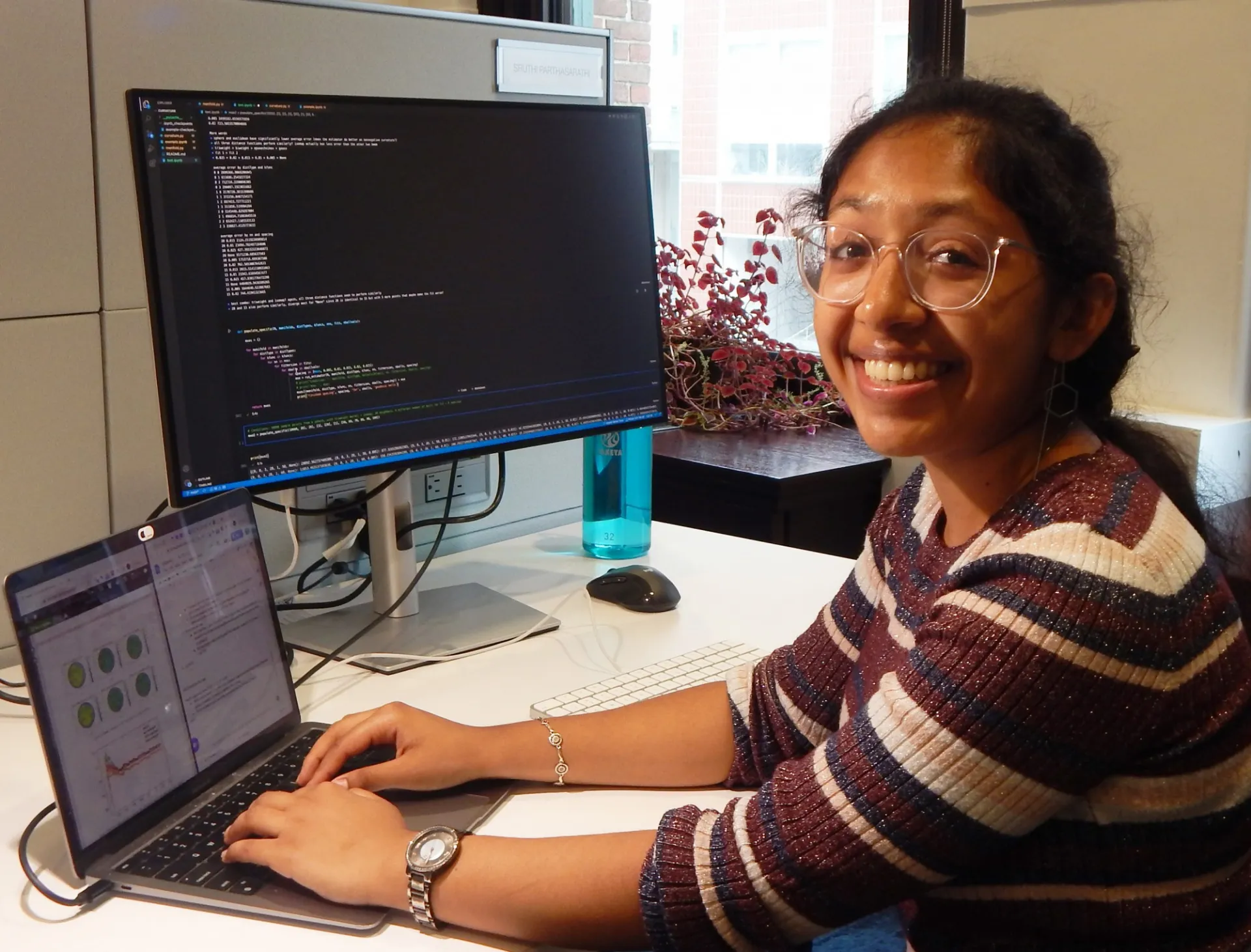 Woman sitting in front of a laptop 