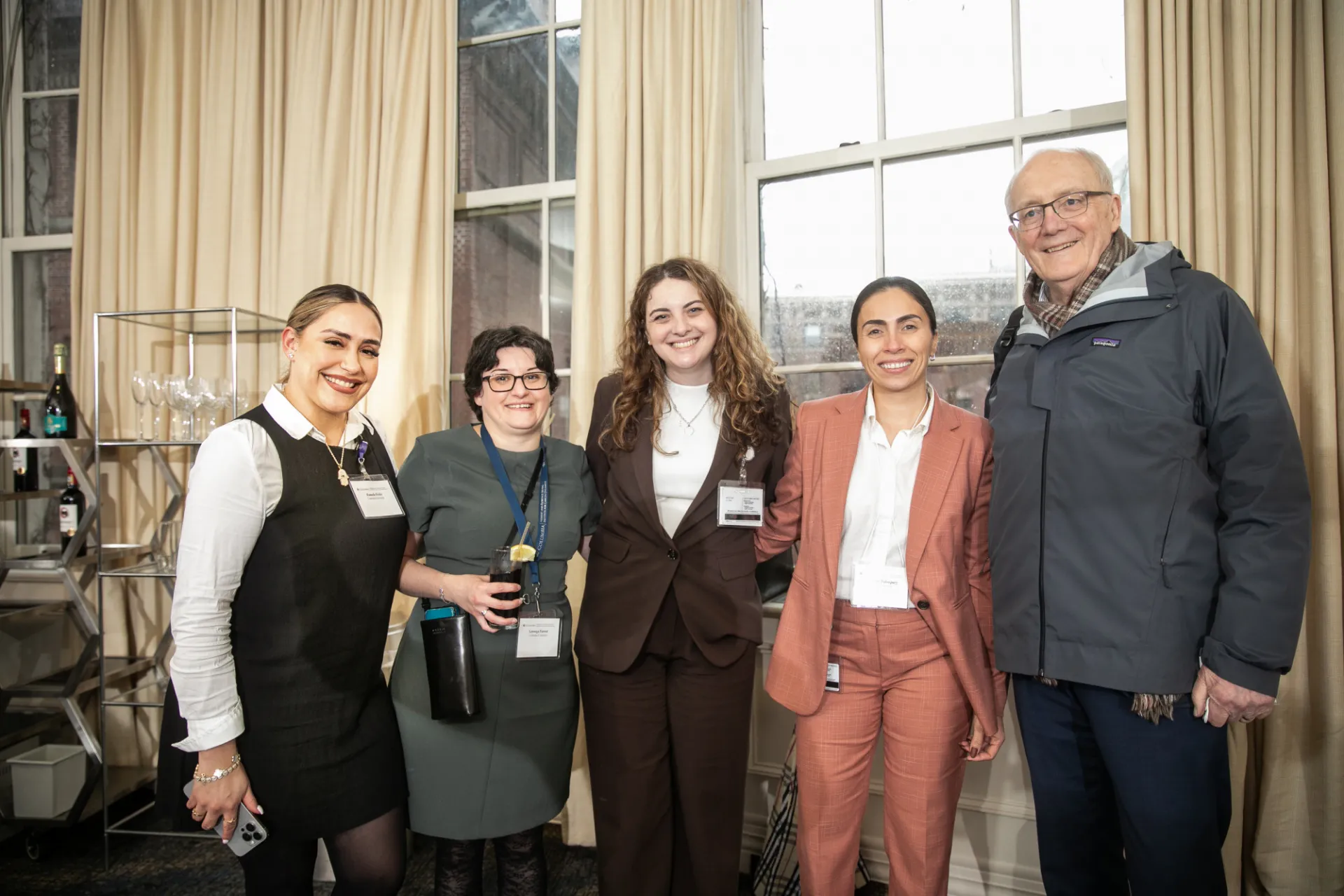 IICD administrative staff members with Director Simon Tavare at the 2026 symposium
